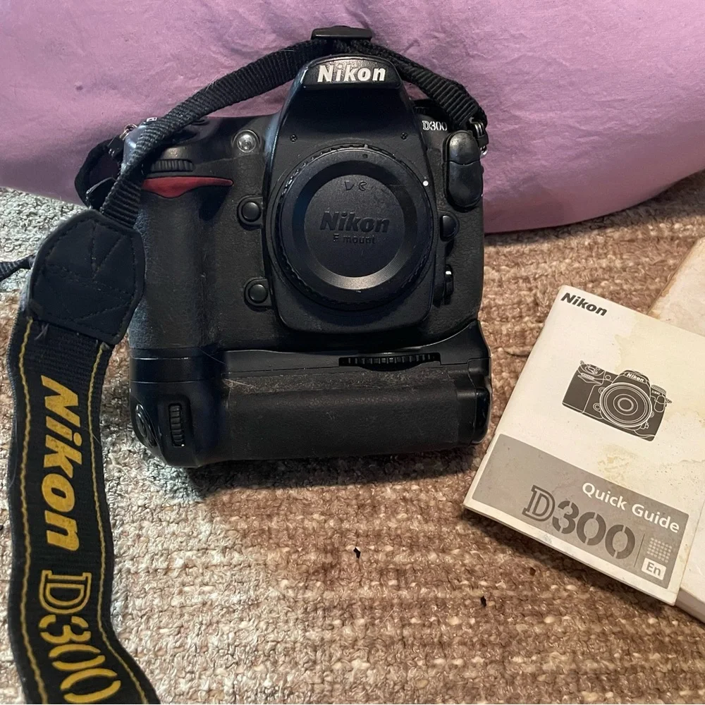 Nikon D300 DSLR camera body with MB-D10 battery grip
